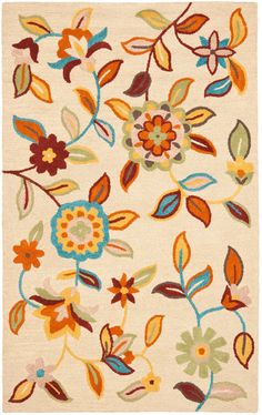 a white rug with colorful flowers on it