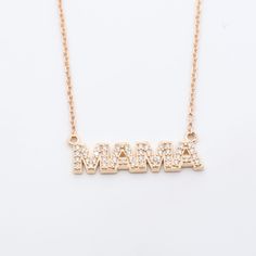 Treat yourself to a sparkly surprise! With Diamond MAMA Necklace you can show off your maternal pride with a dazzling diamond pendant draped around your neck. This timeless piece is sure to be a show stopper! 14k Yellow Gold | 14k White Gold | 14k Rose Gold | Sterling Silver Pendant: 20 x 6 mm 1/10 CTW l1 clarity natural diamond Adjustable 16" | 18" chain Cubic Zirconia Necklaces For Mother's Day Party, Mother's Day Party Necklace With Cubic Zirconia, Mother's Day Party Necklaces With Cubic Zirconia, Mother's Day 14k Gold Jewelry With Diamond Accents, 14k Gold Jewelry With Diamond Accents For Mother's Day, White Gold Diamond Necklace Gift For Mom, Elegant Diamond Jewelry As Gift For Mom, Elegant Necklace With Diamond Accents For Mom, Yellow Gold Jewelry For Mother's Day Party