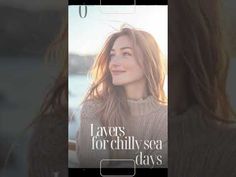 a woman with long hair is looking at her cell phone screen that says layers for chilly sea days