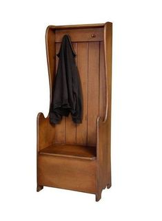 a wooden bench with a coat hanging on it