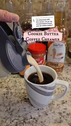 a person pours coffee into a cup