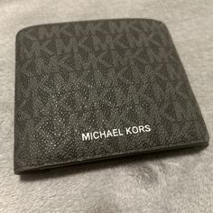 Michael Kors Wallet. Brand New With A Loose Tag. Black Bifold Wallet With Logo, Michael Kors Coats, Gold And Silver Watch, Purple Vests, Neutral Eyeshadow Palette, Neutral Eyeshadow, Michael Kors Men, Michael Kors Wallet, Stainless Steel Watch