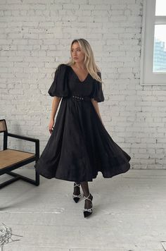 black puff sleeve midi dress with a belt and v-neckline Black Fitted V-neck Belted Dress, Evening V-neck Midi Dress With Fitted Waist, V-neck Belted Midi Dress For Date Night, Elegant Belted V-neck Dress With Short Sleeves, Chic Black A-line Belted Dress, Chic Belted Dress With V-neck, Fitted Black V-neck Belted Dress, Chic V-neck Belted Dress, Elegant Belted V-neck Midi Dress