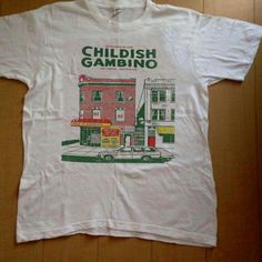 Vintage Childish Gambino T-Shirt Fast Shipping $25 Lowest I Can Do Custom Deadstock Hit Me With Questions Cool Tops Tee Shirts, Screen Print Graphic Tee, I Have Never Been To The Moon Shirt, Retro School Shirt Designs, Vtg T Shirt, Graphic Tee Collection, Vintage Tees Aesthetic, Shirts With Back Designs, Iconic T-shirts