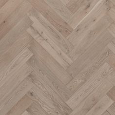 an image of wood flooring that looks like herringbones