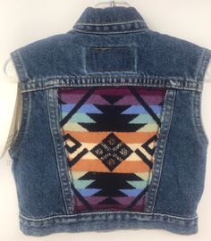 "Pit to pit 12 1/2\"/Length 12\"/Good condition no issues/Discontinued style Camp Wolf no longer carries clothing /Smoke free environment(134)" Vintage Blue Denim Vest For Fall, Retro Blue Denim Vest For Fall, Vintage Pre-washed Fall Jeans, Vintage Dark Wash Jeans For Rodeo, Vintage Denim Jeans For Rodeo, Vintage Jeans For Rodeo With Pockets, Vintage Blue Denim Vest, Vintage Blue Denim Jacket For Festival, Vintage Denim Vest For Festival