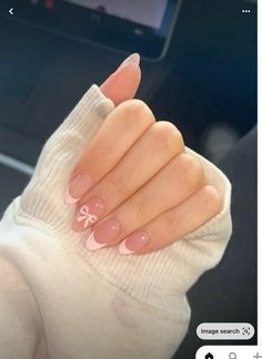 Light Pink Nail Inspo Almond, Oval Nails Pink French Tip, Heart And Bow Nails, Pink French Tip Nails Design, Baby Pink Nails With Bow, Pink French Tip Nails With Bow, White French Tip With Pink Bow, Pink French Tip With Bow, Baby Pink Nails French Tip