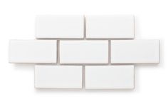 some white tiles on a white wall