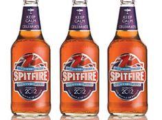 three bottles of sprite cider are shown in this undrecognized image