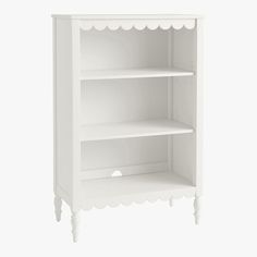 Expertly crafted with sustainable pine, our Penny bookcase adds a classic touch to a nursery, kid's room or playroom. Resting on turned legs and detailed with scalloped molding, this durable design features three shelves for ample storage of their favorite books and toys. The French White finish is rendered in a meticulous, multi-step process, producing visible brushstrokes that bring subtle texture and dimension to the elegant tonal palette. Plus, it's GREENGUARD Gold Certified to contribute to Pottery Barn Bookcase, Pink Baby Nursery, Extra Wide Dresser, 3 Shelf Bookcase, Nursery Dresser, Wide Dresser, Ups Delivery, 7 Drawer Dresser, Bookshelves Kids