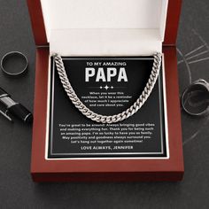 Give your special someone a classic necklace that shows off their strength and style! Our Cuban Link Chain is the perfect gift for Papa keepsake, any occasion, including birthdays and holidays. Available in polished stainless steel or 14K yellow gold, you can be sure this wonderfully weighted necklace will be a staple piece in their wardrobe. And since the chain is adjustable, this Papa gift from son necklace will look spectacular on everyone who wears it.  ✧ YOUR ORDER INCLUDES * An Elegant Wooden Jewelry Box * Message Card * Cuban Chain Necklace ✧ JEWELRY DETAILS * Weight : 28.5 grams (1.005 oz) * Material : Polished stainless steel and 14k yellow gold over stainless steel * Chain Length : 18 - 22 (45.72 cm - 55.88 cm) Adjustable Cable Chain * Chain width: 5 mm * Clasp Style : Parrot Cla Father's Day Silver Jewelry Gift Box, Silver Jewelry With Gift Box For Father's Day, Father's Day Personalized Jewelry Gift, Father's Day Necklace With Gift Box, Classic Jewelry For Father's Day Personalized Gift, Classic Jewelry Gift For Father's Day, Classic Jewelry Gift Box For Father's Day, Classic Father's Day Jewelry With Gift Box, Classic Jewelry For Father's Day With Gift Box