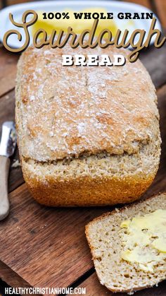 a loaf of bread sitting on top of a wooden cutting board