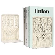 an unon box with white crocheted doily on it and the package next to it