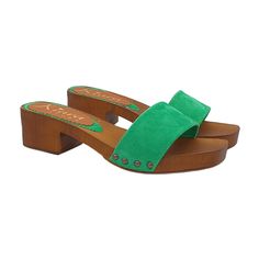 Colorful and super fashion, these clogs make your outfit glamorous. Base in brown wood effect Green suede upper Heel height 4.5 cm and 2 cm platform Square toe Stable and comfortable made entirely in ITALY. Craftsmanship. BEFORE COMPLETING YOUR PURCHASE DO NOT FORGET TO CHECK THE SIZE! Summer Green Mules With Wooden Heel, Green Casual Mules With Wooden Heel, Casual Green Mules With Wooden Heel, Summer Suede Clogs With Stacked Heel, Suede Clogs With Stacked Heel For Summer, Spring Green Open Heel Clogs, Green Clogs With Wooden Heel For Spring, Spring Green Clogs With Wooden Heel, Clogs And Mules