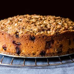 a cake sitting on top of a cooling rack