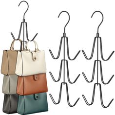 an assortment of purses hanging on hooks