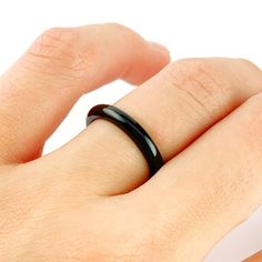 "This ring is perfect for those looking for lightweight comfort while still being stylish! This stone ring is made of hand carved solid Black Onyx and measures 3mm or 1/8\" of an inch in width." Adjustable Black Round Band Jewelry, Minimalist Black Round Band Ring, Black Stackable Rings With Round Band For Gift, Minimalist Black Stackable Rings With Round Band, Black Minimalist Stackable Rings, Minimalist Adjustable Black Rings, Minimalist Black Stackable Rings, Black Gemstone Ring, Stone Stacking