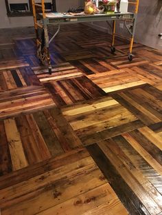 a wooden floor with different colors and patterns