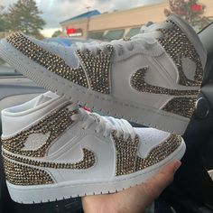 Show off your style with these Golden Rhinestones Custom Air Jordan 1x Wedding Sneaker ! Dare to be different and take your look to the next level - the golden rhinestones add an extra spark of daring and a special touch of shine that will make you stand out from the crowd! Suitable for weddings, sparkling handles at parties!! 🔥 100% genuine, Brand New.👟 Custom sneakers.💫 Every pair is hand-made to order.✨ Best quality waterproof and scratch-proof paints used.✨ 1000+ satisfied customers acros Rhinestone Air Jordan 1, Sparkly Shoes Sneakers, Bridal Jordans, Gold Jordans, Party Sneakers, Custom Air Jordan 1, Casual Shoes Women Sneakers, Bedazzled Shoes, Custom Air Jordan