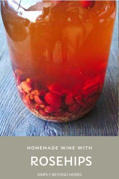 homemade wine with rosehips in a mason jar