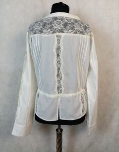 Vintage white cotton lace trim long sleeve blouse with silver tone metal buttons top. The label shows 100% cotton Great vintage condition Flat measurements: shoulders- 40 cm/ 15.8'' chest/armpit to armpit/ - 49 cm/ 19.4'' long - 54 cm/ 21.2'' sleeve/ from shoulder/ - 60 cm/23.6'' Fits like size M Fitted Cotton Shirt With Lace Trim, Fitted Button-up Blouse With Lace Trim, Fitted Button-up Blouse With Lace Cuffs, Fitted Cotton Shirt With Lace Collar, Fitted Button-up Shirt With Lace Trim, Fitted Lace Trim Button-up Shirt, Fitted Long Sleeve Lace Top Shirt, Lace Trim Long Sleeve, Armani White