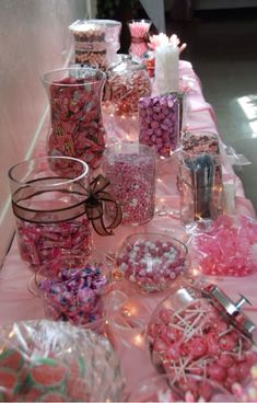 a table topped with lots of candy and candies