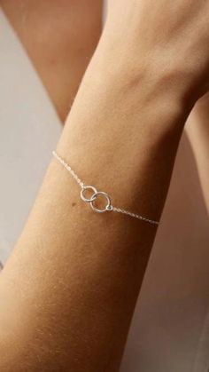 Our sweet Interlocking Circles Bracelet is minimal, modern, and timeless. >> Interlocking Circles Bracelet: https://pinealvisionjewelry.com/products/interlocking-circles-bracelet Modern Adjustable Infinity Jewelry, Minimalist Round Charm Bracelet, Elegant Everyday Charm Bangle Bracelet, Elegant Everyday Bangle Charm Bracelet, Everyday Elegant Bangle Charm Bracelet, Elegant Adjustable Circular Chain Bracelet, Minimalist Round Charm Bracelet For Everyday, White Gold Charm Bracelet For Everyday, Minimalist Charm Bracelet For Wedding