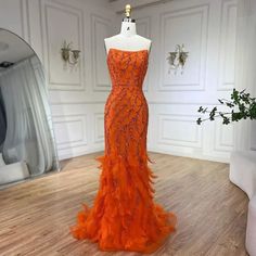 Sunkissed Glamour: Orange Spaghetti Strap Mermaid Evening Gown - Luxury Feather and Bead Detail for Women's Wedding Party Beaded Wedding Dress Mermaid, Heavy Beaded Wedding Dress, Orange Spaghetti, Custom Bridesmaid Dress, Backless Evening Dress, Mermaid Evening Gown, Satin Evening Dresses, Glamour Dress, Evening Dresses Short