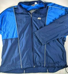 We ship the same or next day and provide a 30-day guarantee! Vintage Blue Nylon Track Jacket, Blue Nike Windbreaker With Pockets, Nike Blue Long Sleeve Windbreaker, Nike Blue Windbreaker With Pockets, Nike Blue Nylon Outerwear, Blue Nike Nylon Outerwear, Blue Nylon Nike Outerwear, Nike Blue Nylon Windbreaker, Nike Mens