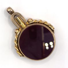 A large, rare 9ct gold Victorian Pocket Watch Fob Key Pendant. It features bloodstone and carnelian, and a twisted rope detail, and can be worn either open or closed. Measures approximately 4.5 cm in length and 2.8 cm wide. Antique Formal Jewelry With Gold Clasp, Vintage Jewelry With Rotating Bezel For Formal Occasions, Victorian Pocket Watch, Key Pendant, Pocket Watch, Pendant Necklaces, Antique Jewelry, Bracelet Watch, Jewelry Necklace Pendant