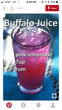 a pink lemonade drink with ice on the rim and in front of it is an ad for buffalo juice