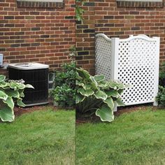 some plants are in front of a brick wall and an air conditioner is on the grass