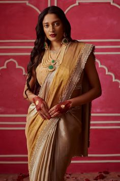 Silver and gold two-tone saree with zardozi embroidered floral motifs embellished with sequins and pearl. Comes with unstitched blouse fabric and potli. - Aza Fashions Festive Gold Embellished Pre-draped Saree, Gold Chanderi Pre-draped Saree With Gota Work, Transitional Gold Pre-draped Saree With Gota Work, Traditional Embellished Pre-draped Saree For Festive Season, Anarkali Style Embellished Pre-draped Saree In Tissue Silk, Embellished Raw Silk Saree With Traditional Drape, Gold Pre-draped Dola Silk Saree With Dupatta, Gold Pre-draped Saree With Resham Embroidery For Reception, Elegant Festive Kundan Blouse Piece