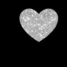 a white heart on a black background with sparkles in the shape of a star