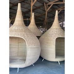 three large wicker baskets sitting on top of each other