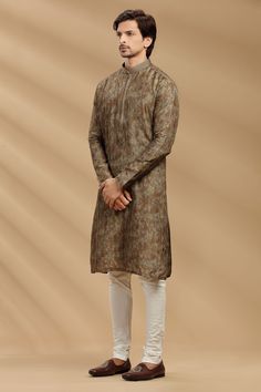 Green Chanderi Silk Kurta Set Traditional  Wear  Care Instructions: Dry Clean Chanderi Slik Fabric with Touch of Stitch Line  Top Details: Color- Green, Fabric - Chanderi slik Bottom Details Color - Cream, Style - free size Chudidar, Fabric -Dhupion Silk Package Include: Kurta and Pajama Additional Information : -As this Sherwani/Waistcoat/Kurta is stitched & made as per orders requested only, So there is NO RETURN & NO EXCHANGE on this product. Kindly Choose your Fit Size and Place your Order. Ceremonial Cotton Silk Straight Kurta, Ceremonial Cotton Silk Kurta For Navratri, Ceremonial Cotton Silk Kurta With Long Sleeves, Ceremonial Long Sleeve Cotton Silk Kurta, Ceremonial Long-sleeve Cotton Silk Kurta, Ceremonial Churidar In Cotton Silk For Eid, Ceremonial Long Sleeve Chanderi Kurta, Ceremonial Cotton Silk Churidar For Eid, Ceremonial Straight Kurta With Dupatta