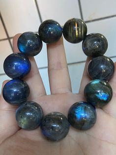 Material:Labradorite beads size :Approx 21mm    quantity: one strand  6mm approx 29 pcs one strands 7mm approx25 pcs one strands 8mm approx 22 pcs one strands 9mm approx 21pcs one strands 10mm approx 19 pcs one strands 11mm approx 18pcs one strands 12mm approx 16 pcs one strands 13mm approx 16 pcs one strands 14mm approx 15 pcs one strands 15mm approx 14pcs one strands 16mm approx 14 pcs one strands 17mm approx 13pcs one strands 18mm approx 13pcs one strands 19mm approx 12pcs one strands 20mm ap Round Labradorite Gemstone Beads Bracelet, Blue Labradorite Bracelets With Round Beads, Labradorite Beaded Bracelets With Round Beads, Labradorite Round Beads For Jewelry Making, Labradorite Gemstone Beaded Bracelets, Grey Moonstone, Moonstone Bracelet, Moonstone Beads, Labradorite Beads