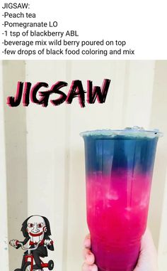 a person holding up a pink and blue drink with the words jigsaw on it