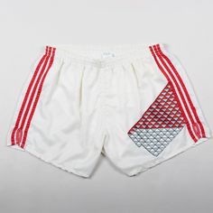 1970s  Adidas Vintage shorts in white Rare piece CONDITIONS: Good vintage conditions  SIZE: Size Large Waist 38 cm Leg length 33 cm Retro White Beach Shorts, White Retro Beach Shorts, Retro White Bottoms For Summer, White Retro Bottoms For Summer, Retro White Summer Shorts, Retro White Summer Bottoms, White Retro Summer Bottoms, Vintage White Bottoms For Summer, Vintage White Summer Bottoms