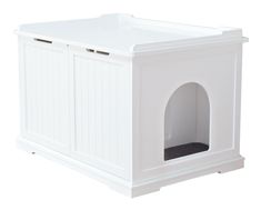 a large white dog house with the door open