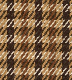 a brown and white checkered pattern on fabric