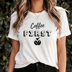 COFFEE FIRST T-SHIRT If you prefer an oversized look, we recommend sizing up. Features: Side-seamed. Shoulder taping. Classic fit. Unisex sizing. Materials: 52% Airlume combed and ring-spun cotton, 48% polyester, 32 singles, 4.2 oz.  LOGO &DESIGN * Actual colors may vary slightly from pictures.  * You can choose your text color from the list in the listing photos. Simply slide the screen to view the choices. * Please do not hesitate to message us if you have questions or concerns. * Please choos Cafe Tshirt Design, Relaxed Fit Coffee Top With Funny Print, Casual Coffee Colored Slogan T-shirt, Casual Coffee T-shirt With Letter Print, Casual Coffee Slogan T-shirt, Casual Coffee T-shirt With Slogan, Coffee Colored Tops With Letter Print For Fall, Casual Coffee-colored Tops With Letter Print, Coffee Letter Print Tops For Fall