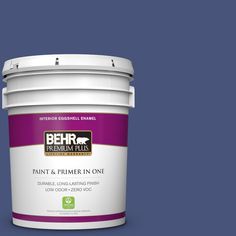 the behr paint and primer in one is shown on a gray background with red trim