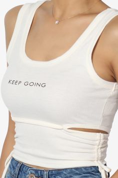 Elevate your sporty chic look with the "Keep Going" Print Scoop Neck Cutout & Ruched Side Ribbed Crop Tank Top.Featuring a lightweight, stretchy polyester blend, this sleeveless, scoop neck top pairs perfectly with high-waisted jeans, shorts, or skirts.Ideal for workouts, casual outings, and summer beach days.Trendy Summer Fashion: Featuring a scoop neck, cutout design, and ruching with tie sides, perfect for casual wear.Versatile Style: Ideal for sporty chic looks, workouts, beach days, and eve Sporty Stretch Ruched Tops, Spring Fitted Ruched Activewear, Spring Stretch Activewear With Ruched Details, Sporty Ruched Activewear For Summer, Summer Ruched Athleisure Activewear, Ruched Summer Athleisure Activewear, Summer Ruched Activewear For Workout, Ruched Athleisure Activewear For Summer, Ruched Activewear For Summer Workouts