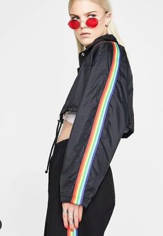 pride jacket rainbow windbreaker crop jacket with drawstring bottom for fit and comfort to wear how you like it snug or loose matching snap up front. easy relax fit (pick up and go jacket) 100 % nylon rain proof and easy to wipe clean and wash completely all lined inside with wicker polyester for non stick to your body comes in all colors if you don't see a color just ask each piece is made custom ( celebrity stylist) the jacket with rainbow stripes down sleeve or it comes with chaotic stripe (p Beige And Black Outfit, Pride Jacket, Rainbow Jacket, Cropped Black Jacket, Mens Face Mask, Green Windbreaker, Rainbow Skirt, Celebrity Stylist, Black Suspenders