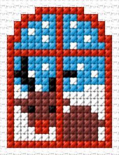 a cross stitch pattern with a dog's head in the center and blue, red, white, and black colors