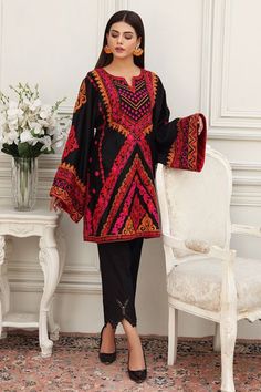 Show details for Ethnic Black Black Resham Embroidered Kurta For Spring, Traditional Black Kurta For Spring, Traditional Black Embroidered Top For Festive Occasions, Traditional Black Lawn Suit For Summer, Black Embroidered Cotton Sets, Traditional Black Embroidered Festive Top, Black Cotton Tops For Eid, Black Embroidered Sets For Spring, Black Embroidered Long Sleeve Lawn Suit