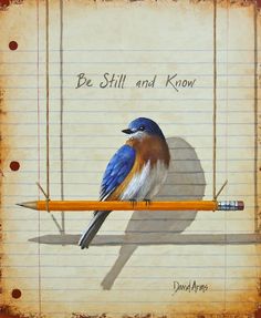 a blue bird sitting on top of a pencil