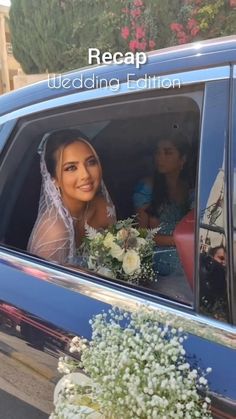 the bride and groom are sitting in their wedding car