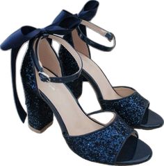 Round Toe Heels With Bow For Prom, Prom Glitter Sandals With Closed Toe, Prom Glitter Closed Toe Sandals, Glitter Low Heel Sandals For Prom, Prom Sandals With Glitter And Closed Toe, Prom Sandals With Satin Bow And Open Toe, Low Heel Glitter Sandals For Prom, Prom Sandals With Round Toe For Party Season, Glitter Closed Toe Sandals For Prom